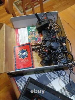 Atari 2600 Console in Box 4 Switch Black good Condition Tested