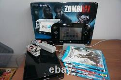 Boxed Wii U = Zombi U premium pack with extra Games in Very Good Condition