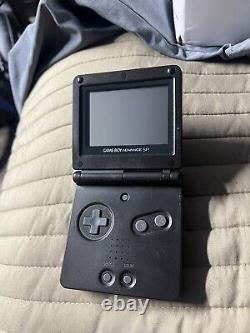 Gameboy Advance SP with charger and game very good condition