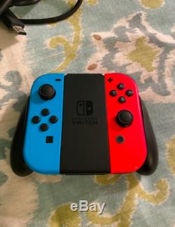 Good Condition Nintendo Switch 32GB Console with Neon Red and Neon Blue Joy-Con