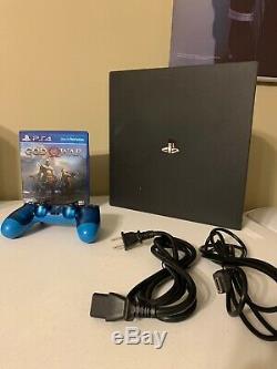 Good condition! Sony PS4 Pro 1TB (God Of War + Blue Crystal CONTROLLER Included)