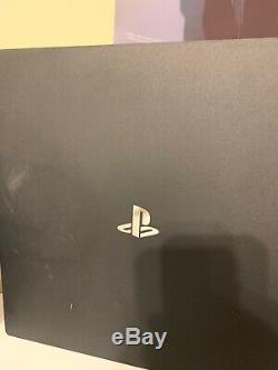 Good condition! Sony PS4 Pro 1TB (God Of War + Blue Crystal CONTROLLER Included)