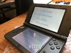 New Nintendo 3DS XL. Formatted. Charger and pen. Screens in good shape