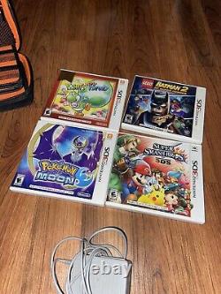 New Nintendo 3DS XL With 4 Games Charger Case Very Good Shape