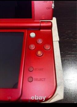 New Nintendo 3ds XL Metallic Red Console. Charger. 2 Games. Good Condition. US