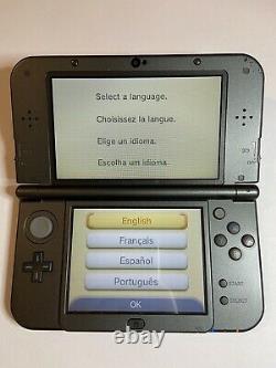 New nintendo 3ds xl black handheld game console good condition with charger