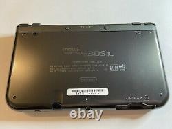 New nintendo 3ds xl black handheld game console good condition with charger