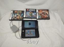 Nintendo 3DS XL USED IN GOOD CONDITION WITH CHARGER and 4 Games