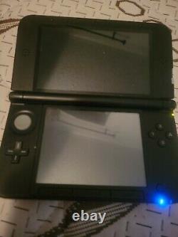 Nintendo 3ds XL red with pokemon sun, stylus and charger in good condition
