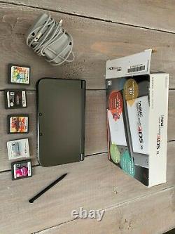 Nintendo New 3DS XL 4GB Black Handheld System and 5 games too! Very good shape