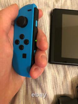 Nintendo Switch 32 GB Neon Red Neon Blue. Good Condition. With Extra Battery