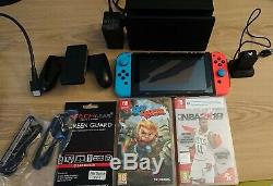 Nintendo Switch 32GB Neon Console. Used very good condition. Old battery version