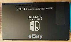 Nintendo Switch 32GB Neon Console. Used very good condition. Old battery version