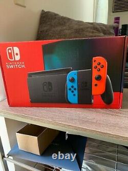 Nintendo Switch 32GB Neon Red/Neon Blue Console. Used once. Very good condition