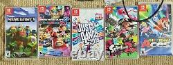 Nintendo Switch Bundle + Games + SD Card Used Good Condition