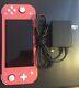 Nintendo Switch Lite, Coral (charger Included) Slightly Used Good Condition