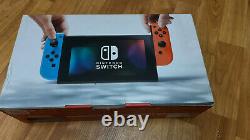 Nintendo Switch (Red & Blue Joy-Con) Very Good Condition With Pikachu Game