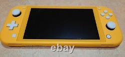 Nintendo Switch lite with charger, yellow, used, good working condition