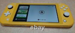 Nintendo Switch lite with charger, yellow, used, good working condition