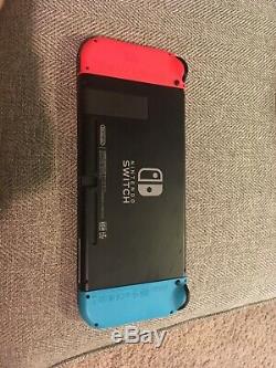 Nintendo switch used good condition, comes Breathe of the wild and Smash Bros