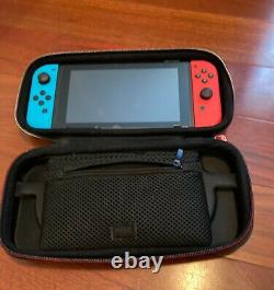 Nitendo Switch console used with case and screen protector. In good condition
