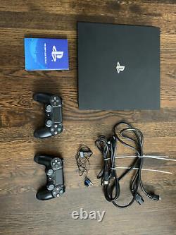PS4 Pro Jet black- 1tb- Used- Extra Controller- Very Good Condition