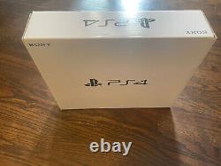 PS4 Slim Good Condition Comes With Original Box 4 Games