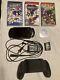 Psp 1000 Bundle With Charger Extra Battery Grip And Games. Very Good Condition
