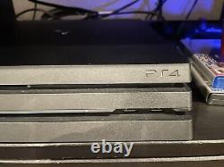 Playstation 4 with 2 controller used but in good condition
