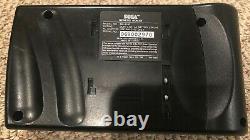 Sega Genesis Nomad Handheld in Good Condition with Power Supply