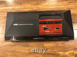 Sega Master System Console withControllers. Complete in Box. Very Good Condition