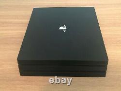 Sony PlayStation 4 Pro 1TB Console Black in good condition, with 5 games