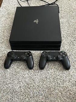Sony PlayStation 4 Pro 1TB Jet Black Good Condition 2 Controllers