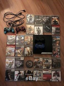 Sony PlayStation3 With 30 Games and 2 Controllers. Very Good Condition