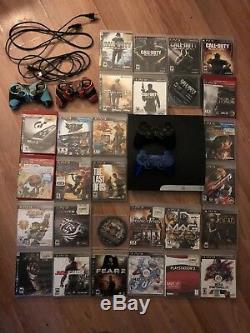 Sony PlayStation3 With 30 Games and 2 Controllers. Very Good Condition