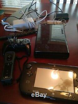 Wii U console black 32GB bundle with 9 games used in very good condition