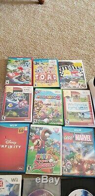 Wii u console bundle 32G used in good condition with 15 games + 2 downloaded