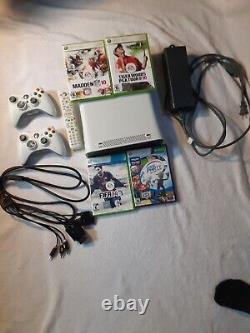 Xbox 360 white console, 4 games, remotes good condition