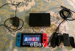 Bonne Condition Nintendo Console Switch 32gb Avec Neon Neon Rouge Et Bleu Joy-con