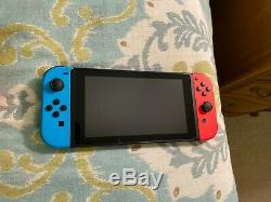 Bonne Condition Nintendo Console Switch 32gb Avec Neon Neon Rouge Et Bleu Joy-con