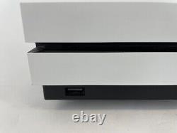 Console Microsoft Xbox One S blanche 1 To en très bon état avec câbles