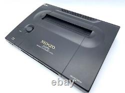 Console Neo Geo AES avec manette SNK Pro et adaptateur secteur en bon état, testée.