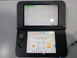 Console Nintendo 3DS XL Bleu NTSC avec lot de 4 jeux et étui en bon état