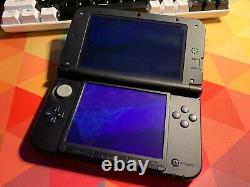 Console Nintendo 3DS XL Gris/Noir en très bon état avec stylet FONCTIONNEL