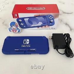 Console Nintendo Switch Lite de couleur bleue, boîte japonaise, chargeur, en très bon état.
