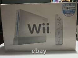 Console Nintendo Wii RVL-001 complète dans sa boîte avec Wii Sports en bon état