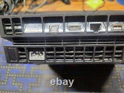Console Sony PlayStation 4 CUH-1115A en bon état de fonctionnement avec câbles et manette