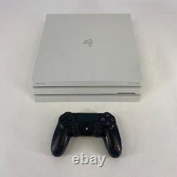 Console Sony Playstation 4 Pro blanche 1 To en très bon état avec manette