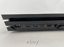 Console Sony Playstation 4 Pro noire 1 To en bon état avec bundle