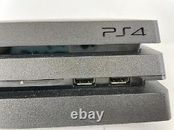 Console Sony Playstation 4 Pro noire 1 To en bon état avec bundle